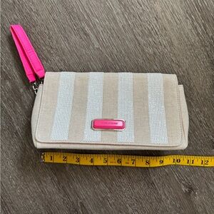 Victoria’s Secret clutch bag beige with hot pink details and white sequins.